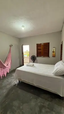 Uma cama ou camas num quarto em Casa Rengai - Praia de Guajiru