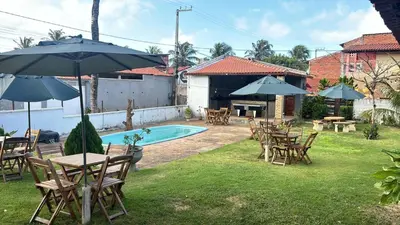 Um jardim no exterior de Casa Rengai - Praia de Guajiru