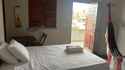 Uma cama ou camas num quarto em Casa Rengai - Praia de Guajiru