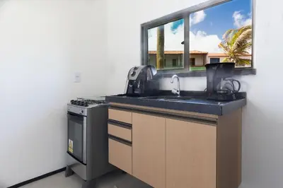 A cozinha ou kitchenette de Beachfront Duplex #A3 - Beira mar por Carpediem