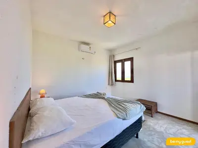 Uma cama ou camas num quarto em Reserva BeachFront - Retirinho