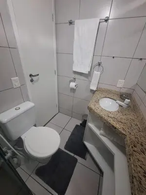 Uma casa de banho em Piscina na Cobertura
