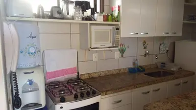 A cozinha ou kitchenette de Piscina na Cobertura