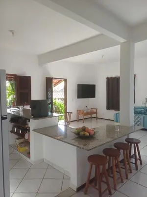 Uma televisão e/ou sistema de entretenimento em Casa Mar