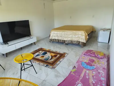Uma cama ou camas num quarto em Chácara Nossa Senhora Aparecida