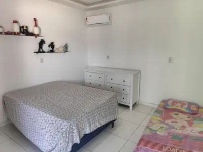 Uma cama ou camas num quarto em Chácara Nossa Senhora Aparecida
