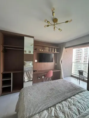 Uma cama ou camas num quarto em Studio Fortal