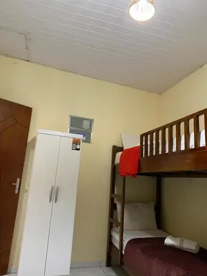 Uma cama ou camas num quarto em Pousada ExtraLar
