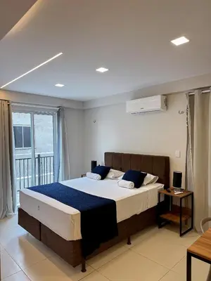 Uma cama ou camas num quarto em Home Studio