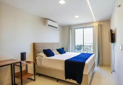 Uma cama ou camas num quarto em Home Studio