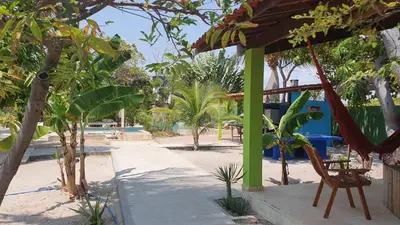 Um jardim no exterior de Casa MCAYA