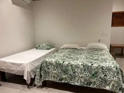 Uma cama ou camas num quarto em Casa MCAYA