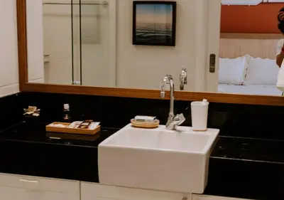 Uma casa de banho em Seu Refúgio Pé na Areia