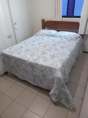 Uma cama ou camas num quarto em Flat no Meireles 302