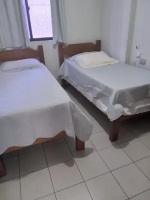 Uma cama ou camas num quarto em Flat no Meireles 302