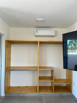 Uma televisão e/ou sistema de entretenimento em Casa da Lagoa near Barrinha