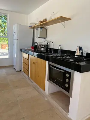 A cozinha ou kitchenette de Casa da Lagoa near Barrinha