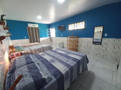 Uma cama ou camas num quarto em Pousada Sítio Boas Novas