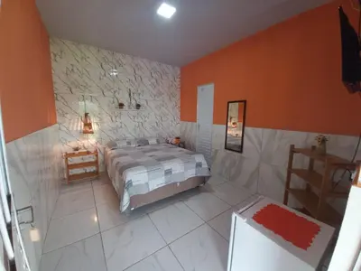 Uma cama ou camas num quarto em Pousada Sítio Boas Novas