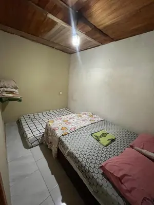 Uma cama ou camas num quarto em Casa Refúgio do Alto
