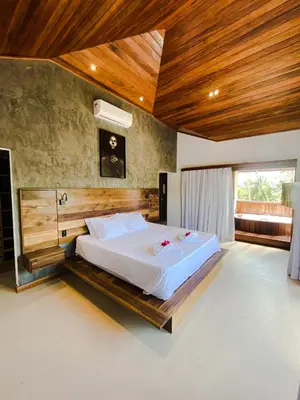 Uma cama ou camas num quarto em Hura Vilas