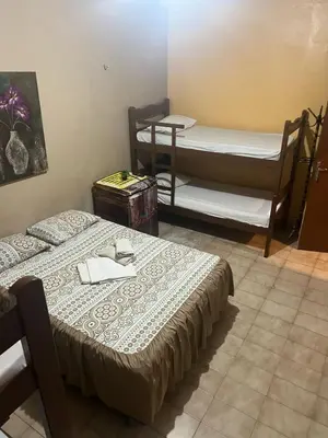 Uma cama ou camas num quarto em Pousada Sol de Iracema Praia