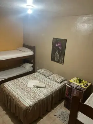 Uma cama ou camas num quarto em Pousada Sol de Iracema Praia