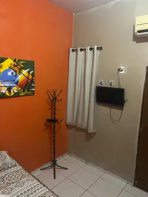 Uma cama ou camas num quarto em Pousada Sol de Iracema Praia