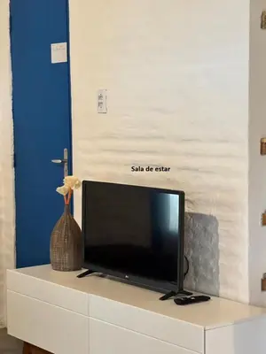 Uma televisão e/ou sistema de entretenimento em CasaBi - Casa na Taiba 4 quartos