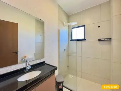 Uma casa de banho em Beachfront Duplex B por Be My Guest