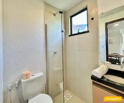 Uma casa de banho em Beachfront Duplex B por Be My Guest