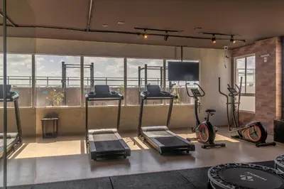 O centro de fitness e/ou as comodidades de fitness de Mirante #1004 - Apê confortável by Carpediem