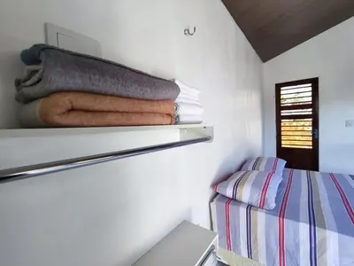 Uma cama ou camas num quarto em Chalé Bella Vista