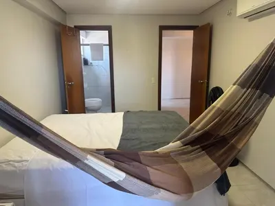 Uma cama ou camas num quarto em Apto no Porto das Dunas - Scopa Beach