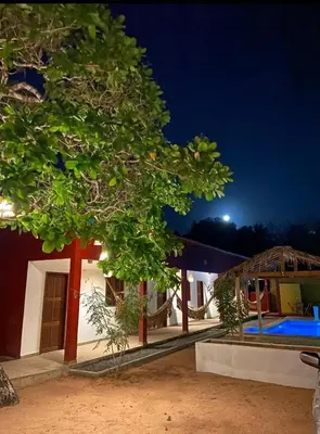 Um jardim no exterior de Maruá Pousada da Lagoa