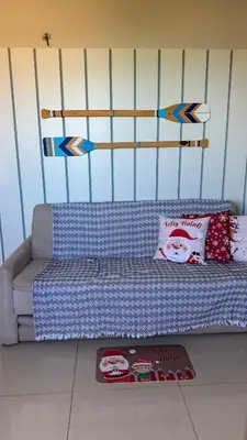 Uma área de estar em Sunrise Apartamentos