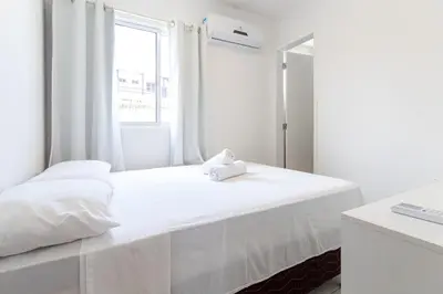 Uma cama ou camas num quarto em Beach Townhouses - Porto das Dunas By Carpediem