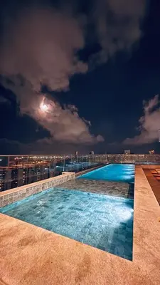 A piscina em ou perto de Studio moderno e equipado, a poucos passos da Beira Mar