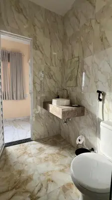 Uma casa de banho em Pousada Itarema Residence