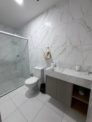 Uma casa de banho em Casa da Maré Pé na areia Suítes climatizadas e deck vista mar