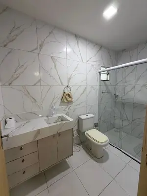 Uma casa de banho em Casa da Maré Pé na areia Suítes climatizadas e deck vista mar