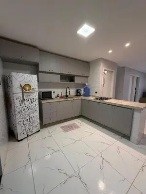 A cozinha ou kitchenette de Casa da Maré Pé na areia Suítes climatizadas e deck vista mar