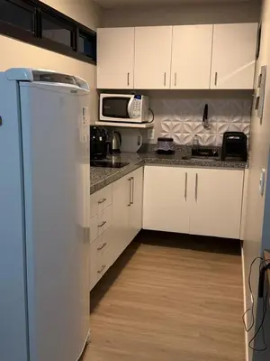 A cozinha ou kitchenette de Scala Residence - Beira Mar Fortaleza - Apto 408