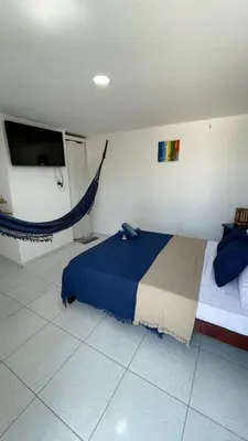 Uma cama ou camas num quarto em Suíte Mykonos Canoa Quebrada- Ao lado da Broadway