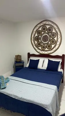 Uma cama ou camas num quarto em Suíte Mykonos Canoa Quebrada- Ao lado da Broadway