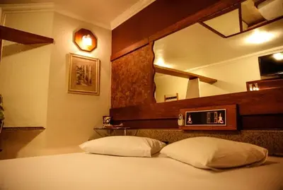 Uma cama ou camas num quarto em Bali Motel (Adults Only)