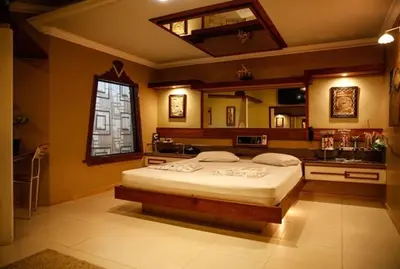 Uma cama ou camas num quarto em Bali Motel (Adults Only)
