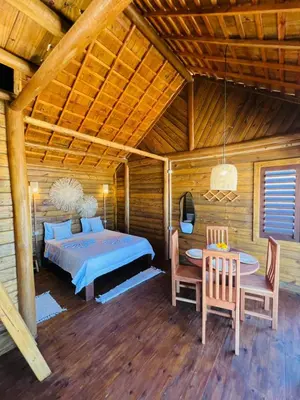 Uma cama ou camas num quarto em Chalet Paraiso Canoa 3 na praia - Canoa Quebrada