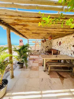 Uma varanda ou terraço em Chalet Paraiso Canoa 3 na praia - Canoa Quebrada