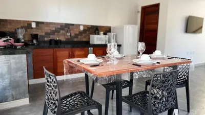 A cozinha ou kitchenette de Chalés da Bica - Modernidade e Aconchego a 100m da Praia